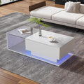 Moderner Couchtisch in Hochglanz mit LED-Beleuchtung, Glasplatte un